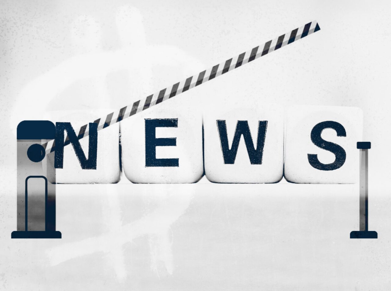 The word "NEWS" displayed on four blocks with a striped barrier arm positioned diagonally over them, partially obstructing the view.