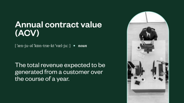 Definition of "Annual contract value (ACV)" with a top-down image of people working at desks.